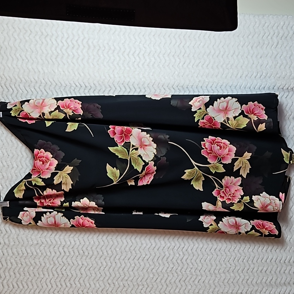 Emma James pluse size black/floral maxi skirt.